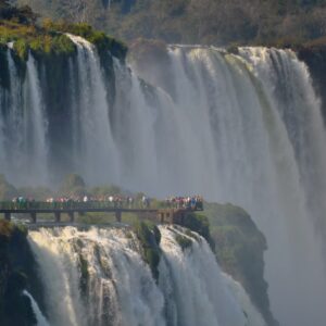 people-looking-at-large-waterfall-featured